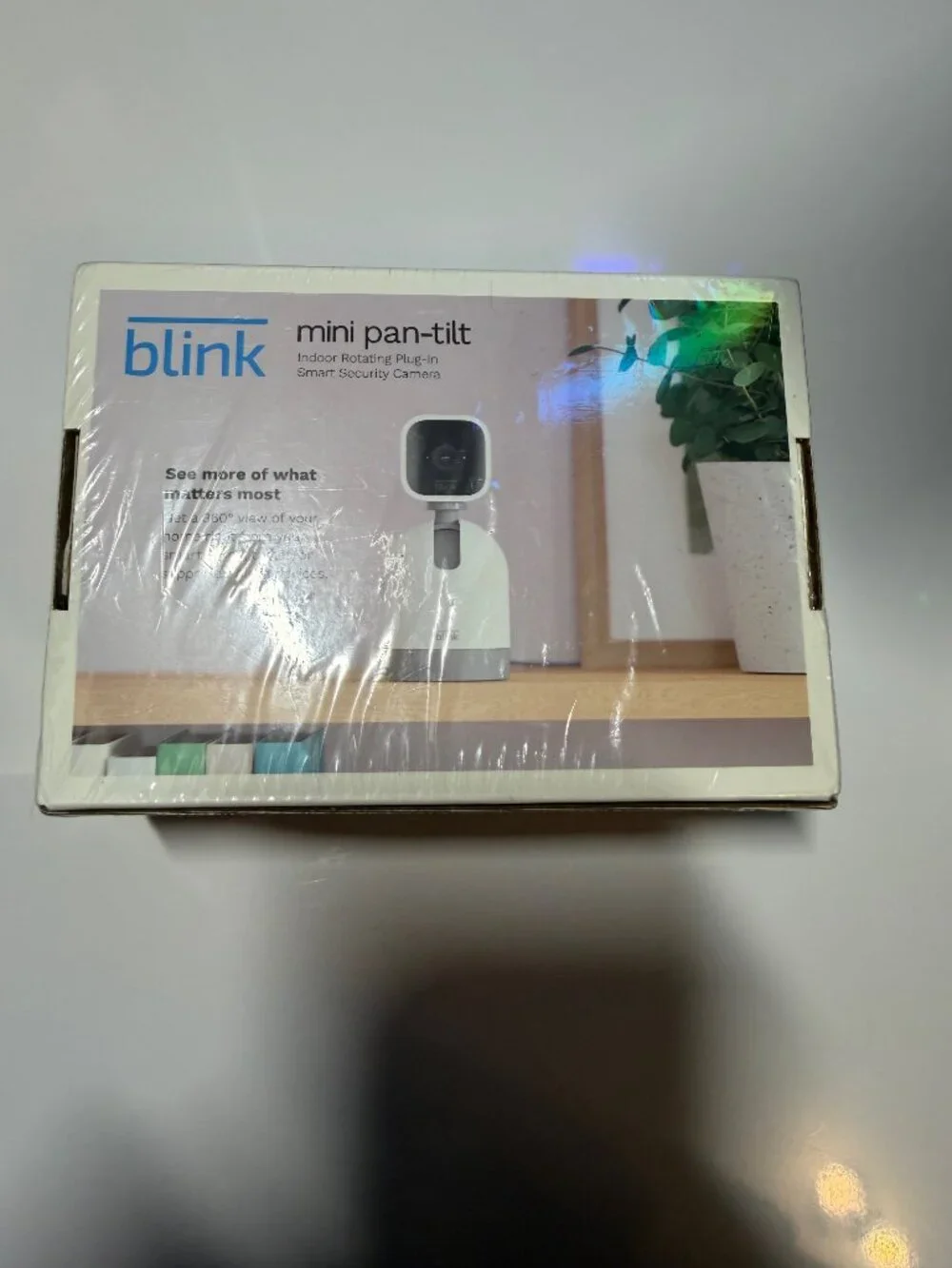 Blink Mini Pan-Tilt Camera (new) and Sync Module (used)